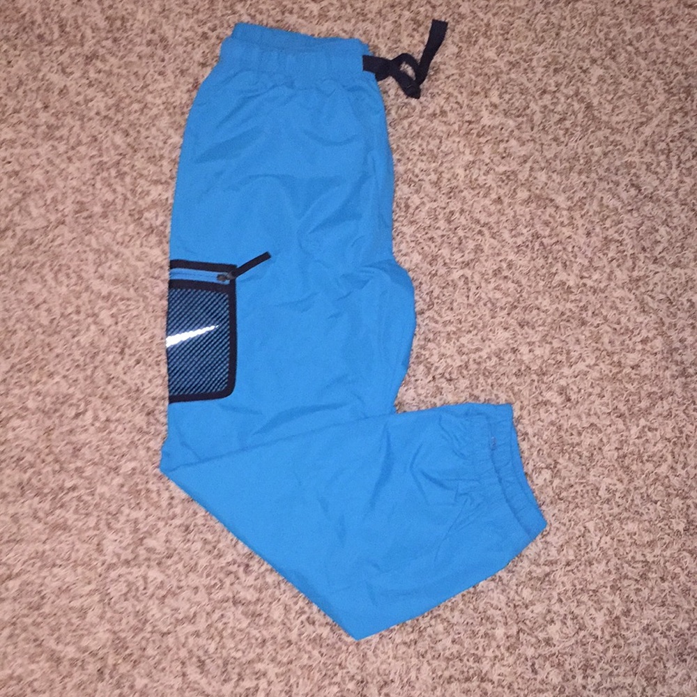 Nike x Supreme trail pants size large in blue.